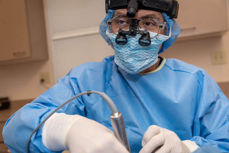 dr faiella performing bone grafting procedure