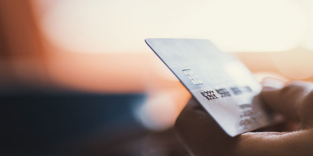 patient paying for dental procedure